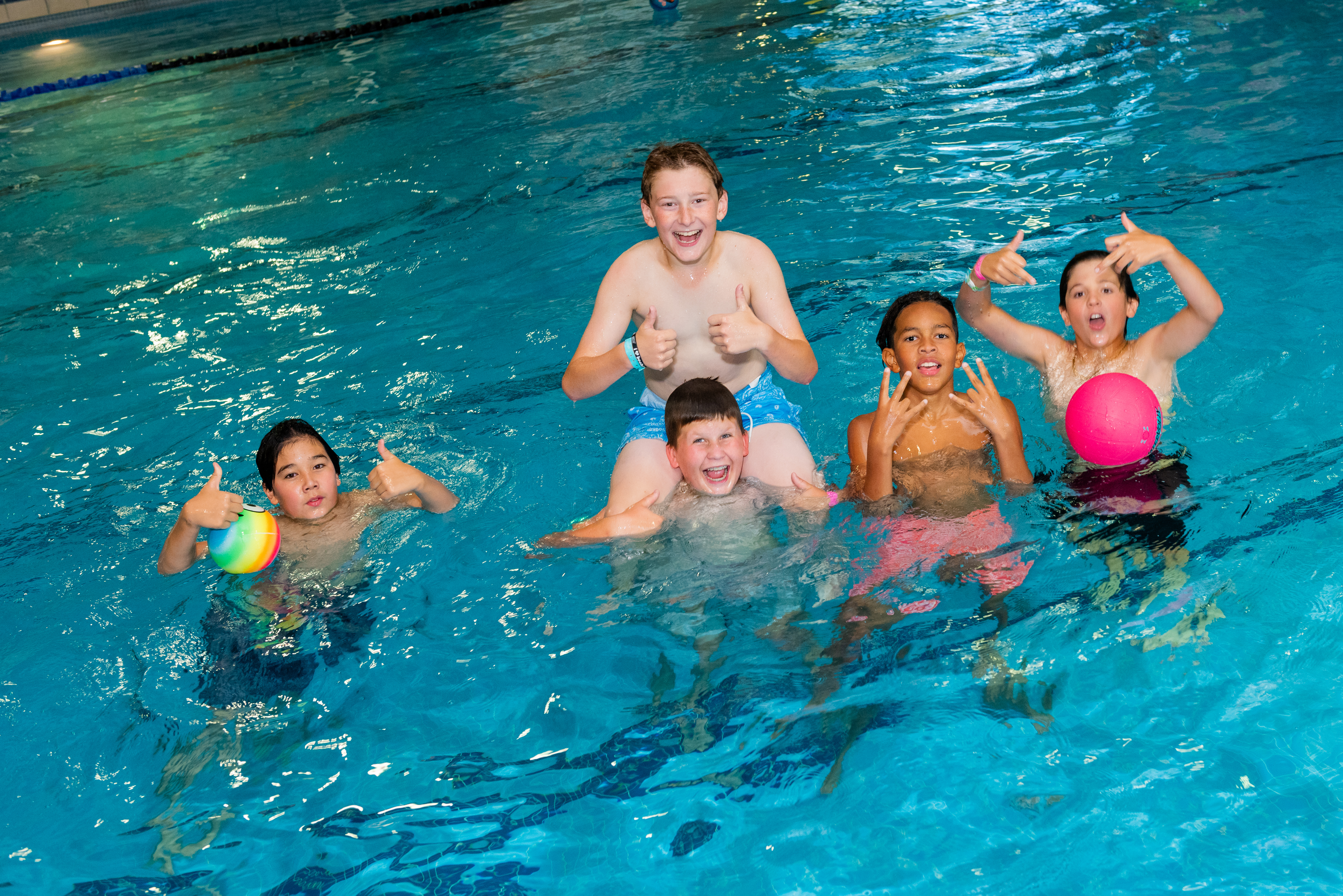 Teens have fun in the PRC pool at a Teen Night.