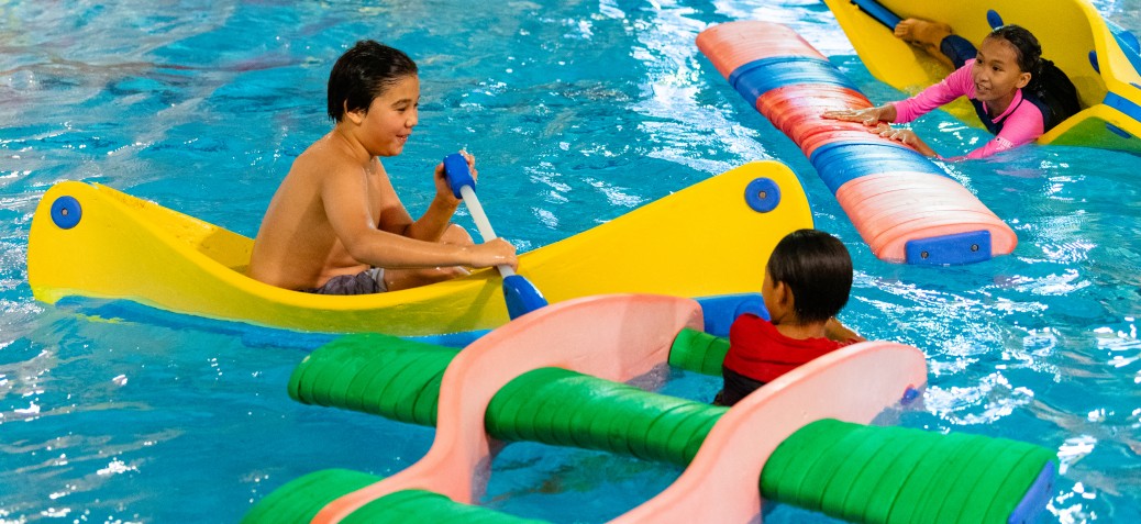 Teens play in the pool at PRC.