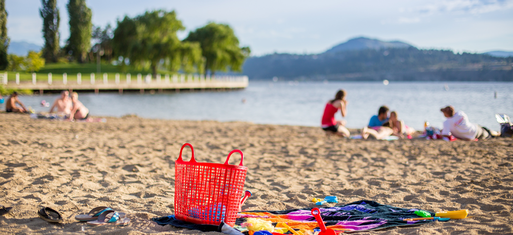 beach towels left on Tugboat beach in the summer