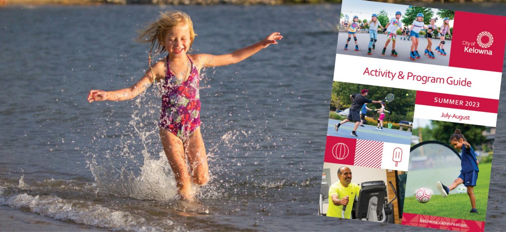 A child smiling and running through the water at Tugboat Bay with a copy of the Activity Guide overtop