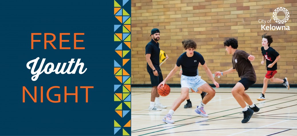 A group of youth playing basketball in the gym at PRC