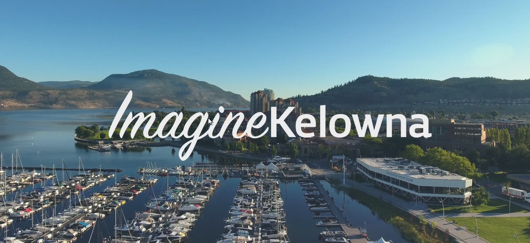 Imagine Kelowna cover photo overlooking downtown marina