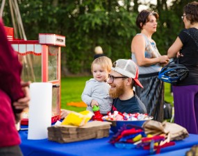 Child and parent at neighbourhood event