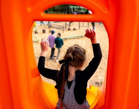 Girl on slide at summit park